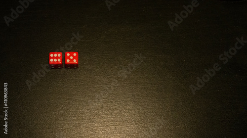 Dice combination on a black wooden surface