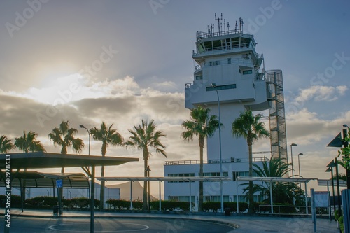 Air traffic control tower within sunrise