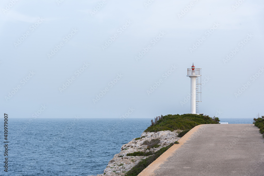 White lighthouse near the sea