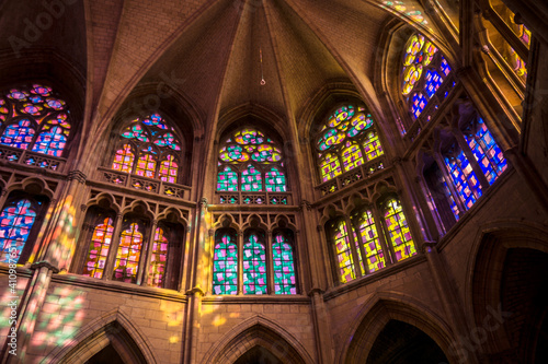 Inside the gothic St Cyr Ste Juliette Cathedral of Nevers, a city located in Burgundy, France. The stained glass windows are modern and were installed after WWII.