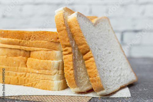 Sliced bread on dark grunge...