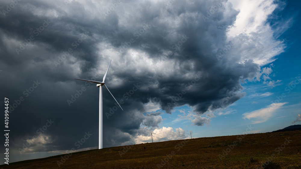Storm clouds brewing over a wind turbine in Kittitas County in central Washington State as welcome windy weather approaches 