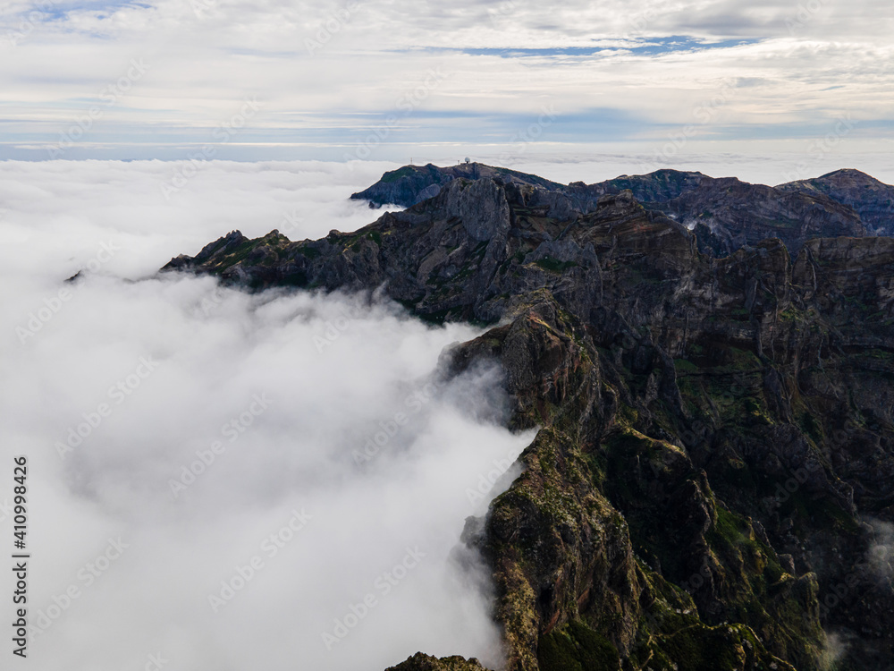View of beautiful mountain landscape above the clouds of Madeira Island - Green mountain landscape with view above the sky