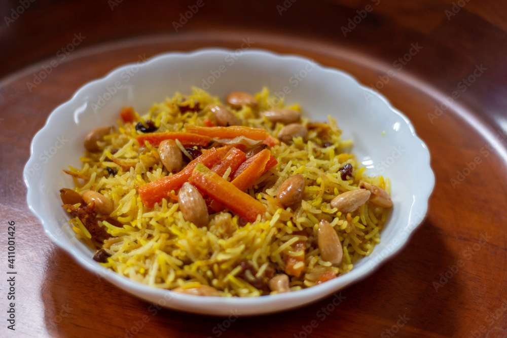 saffron basmati rice with carrots and raisins and blanched almonds