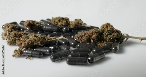 Wallpaper Mural Tablets and Cannabis Buds on White Background, Isolated. Weed as Medicine and Drug in CBD or THC Torontodigital.ca