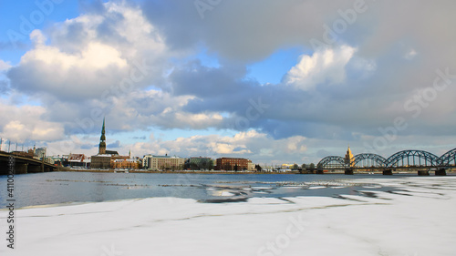 riga, city panorama, frozen river and snow in the foreground © fotofotofoto