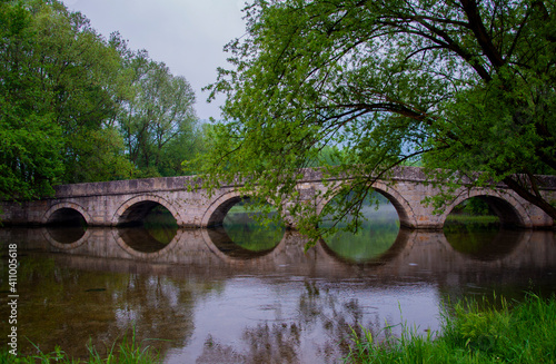 Roman bridge reflection on river Bosna in Sarajevo © Minchy