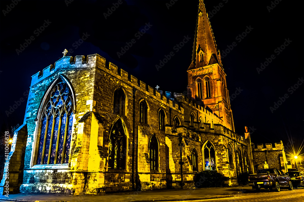 A view across the rear of the Church in Market Harborough, UK at night