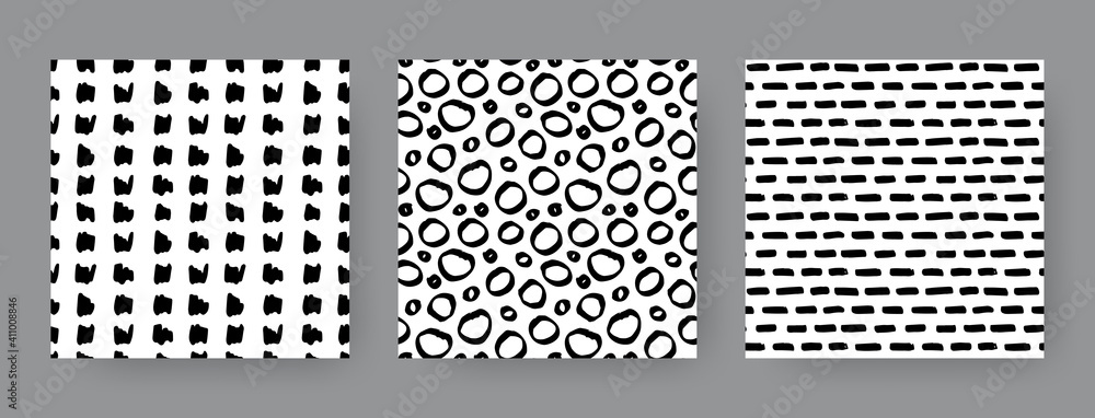 Set of hand-drawn seamless black and white patterns with circles, dashes and stripes. Vector backgrounds.