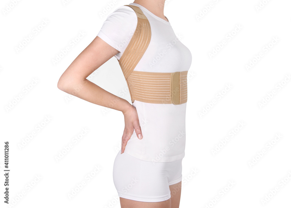 Orthopedic lumbar corset on the human body. Back brace, waist support belt  for back. Posture Corrector For Back Clavicle Spine. Post-operative Hernia  Pregnant and Postnatal Lumbar brace after surgery. Stock Photo