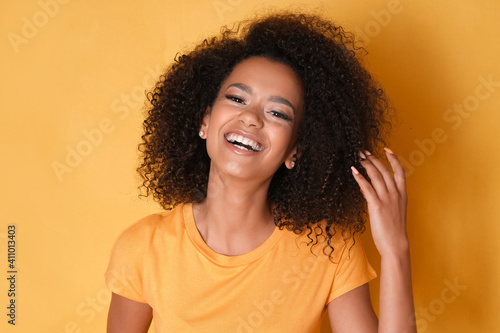 Cheerful African american female model. © forma82