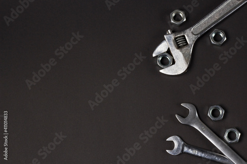 Set of wrenches on a black background