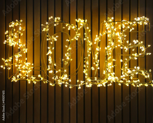 Love Illuminated Garlands lettering on a dark background photo