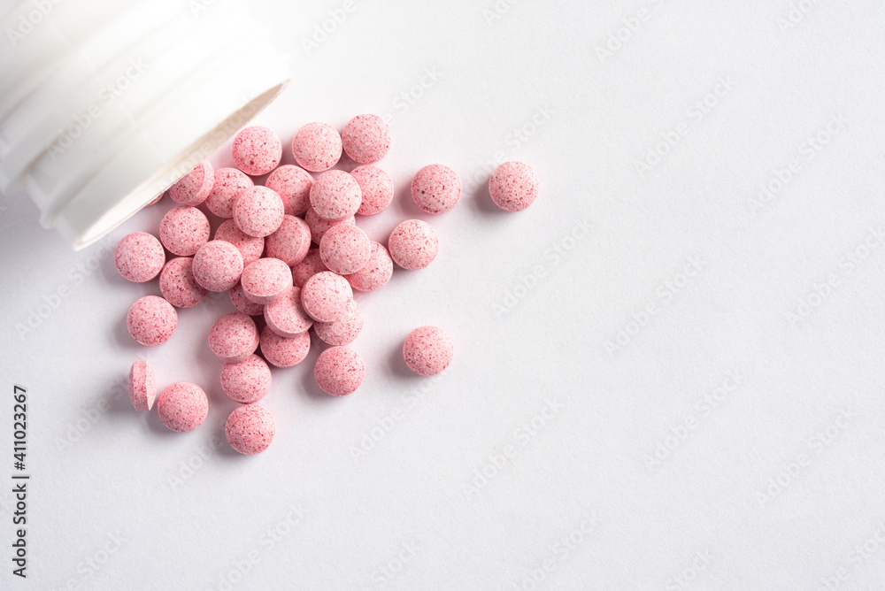 Vitamin B 12 Supplements Spilled from a Bottle Vitamin B 12 Supplements Spilled from a Bottle