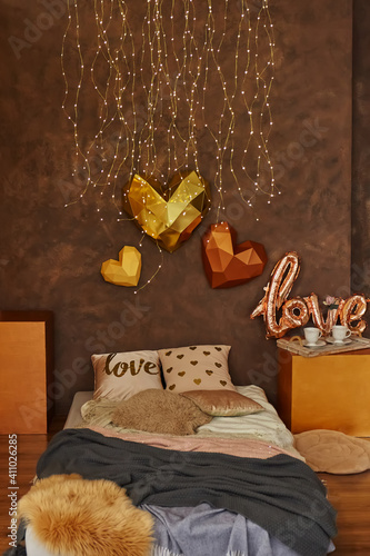 Romantic interior in brown colors with bed photo