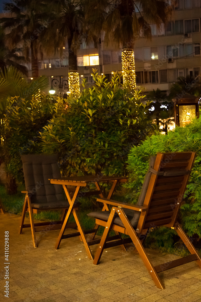 Fototapeta premium cozy summer cafe, restaurant, with a stylish interior and furniture