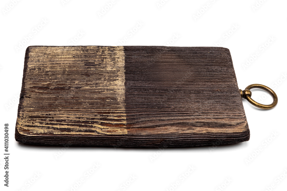Old chopping board with a round metal ring. Empty Wooden Cutting Board with structure and crackes, scratched, black or brown, half is painted. Old chopping board with a round metal ring. Empty Wooden Cutting Board with structure and crackes, scratched, black or brown, half is painted.