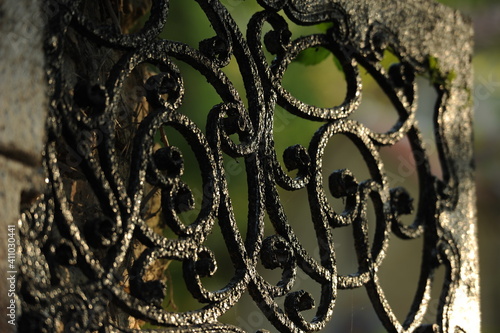 Detail of old wrought iron fence at the beautiful gardens in Balchik, Bulgaria. © samy