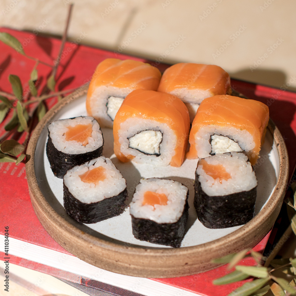 Assorted sushi set at home. Sushi background. Asian or Japanese food Assorted sushi set at home. Sushi background. Asian or Japanese food