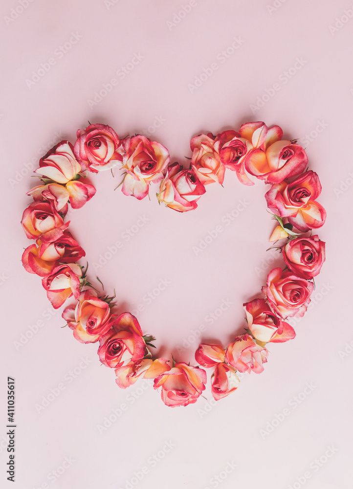 Rose in a heart shape on pink background. Rose in a heart shape on pink background.