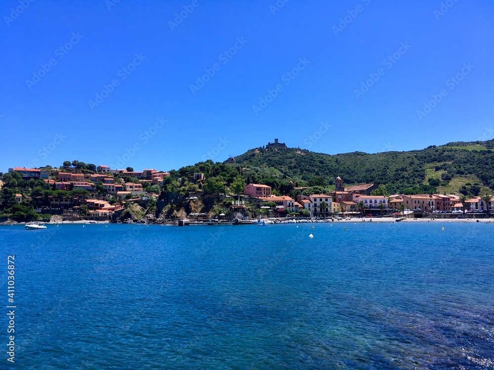 scenic view of Collioure by the mediterranean sea  against blue sky