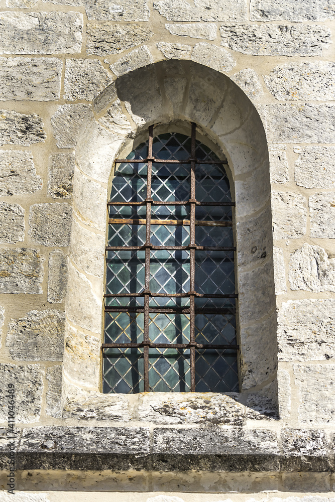 Fototapeta premium Saint Redegund Church at Giverny (Eglise sainte Radegonde, XI - XVI century). Monet family tomb in churchyard. Giverny, Normandy, France, Europe.