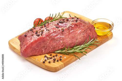 Uncooked beef meat with spices, isolated on white background