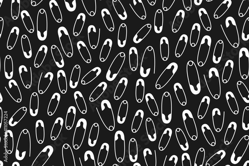 Safety pin cartoon seamless pattern. Sewing pins hand drawn tailoring monochrome flat design. Scrapbook  wrapping paper  textile  fabric  wallpaper  tile black background vector illustration