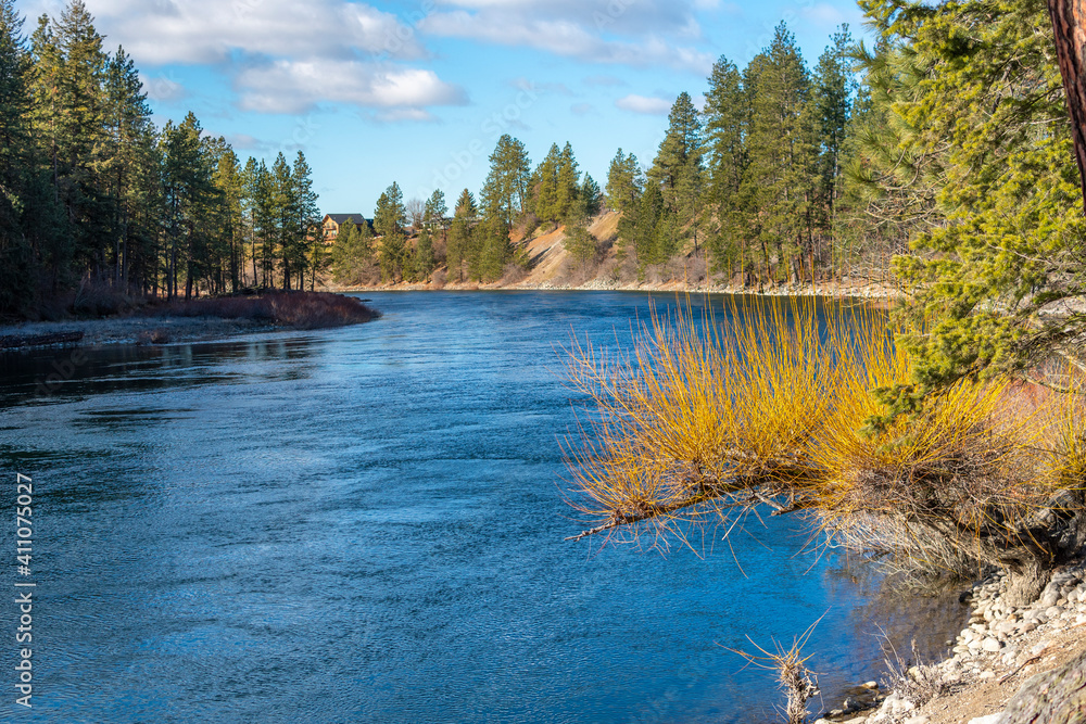 A section of the Spokane River at Corbin Park in the rural Northwest town of Post Falls, Idaho, USA A section of the Spokane River at Corbin Park in the rural Northwest town of Post Falls, Idaho, USA