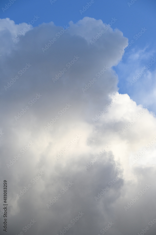Dramatic and glowing cloudscape of blue sky and white and gray clouds as a nature background
Dramatic and glowing cloudscape of blue sky and white and gray clouds as a nature background