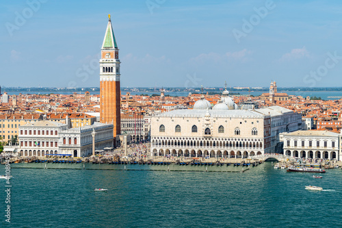 View of Venice in a clear sunny day with the most iconic landmarks: St Mark's Basilica bell tower and Doge's Palace