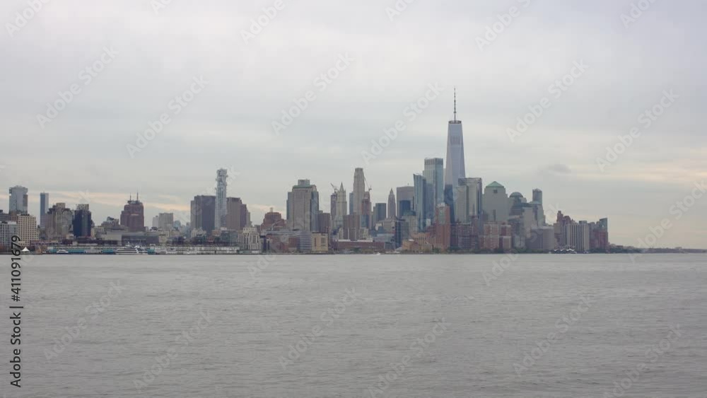 Downtown Manhattan seen from Hoboken in New Jersey. Famous NYC Skyline. Popular tourist destination and large Banking District in USA Downtown Manhattan seen from Hoboken in New Jersey. Famous NYC Skyline. Popular tourist destination and large Banking District in USA