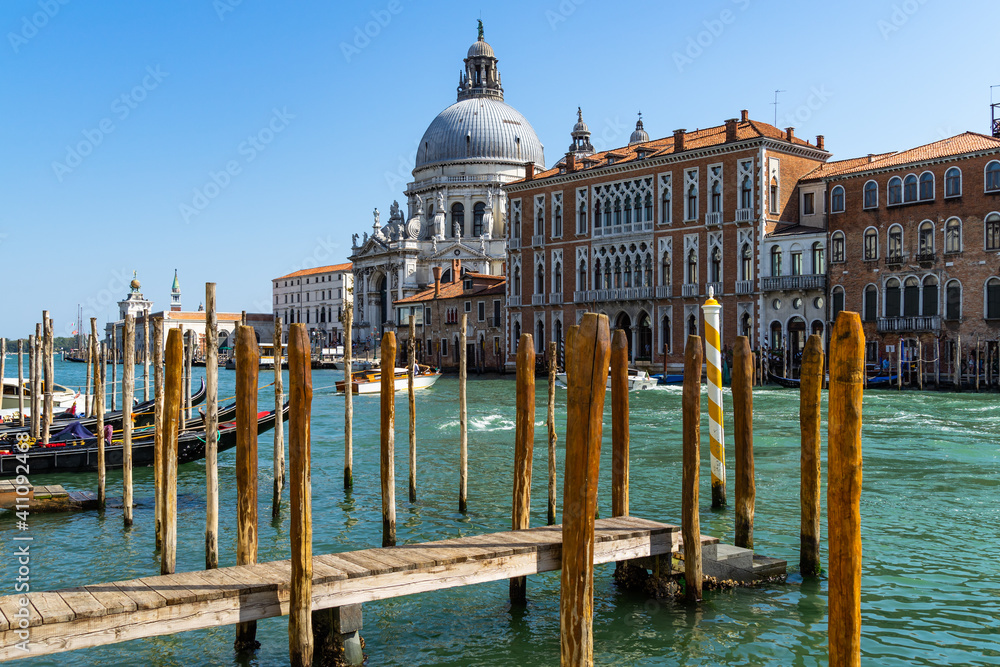 Gondola pier on the Grand Canal near the basilica of Santa Maria della Salute, Venice, Italy