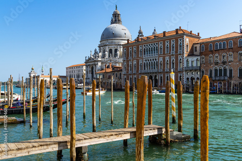 Gondola pier on the Grand Canal near the basilica of Santa Maria della Salute, Venice, Italy