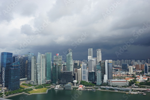 Aerial view of Skyscraper and Marina Bay area with cloud from infinity rooftop pool in Singapore -                                                                                                     