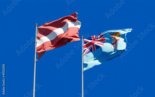 Flags of Fiji and Latvia.