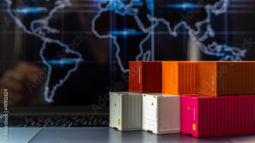Photography Global business container cargo ship in import export business logistic, Company shipping delivery and logistics technology business industrial, Container on computer laptop notebook selective focus