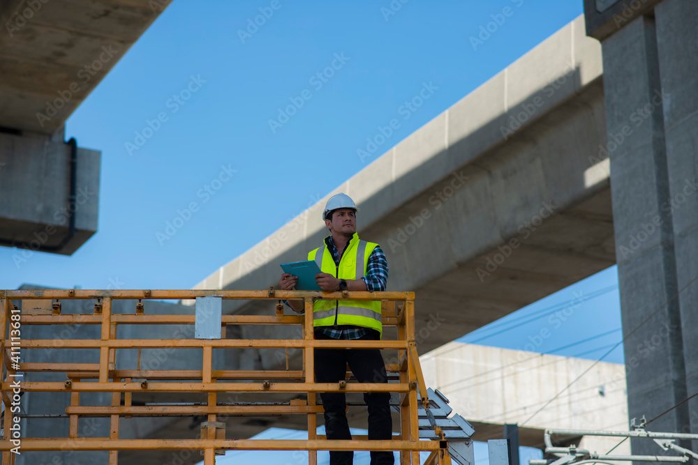 construction worker on Scaffolding. construction workers on a construction site. construction worker on Scaffolding. construction workers on a construction site.