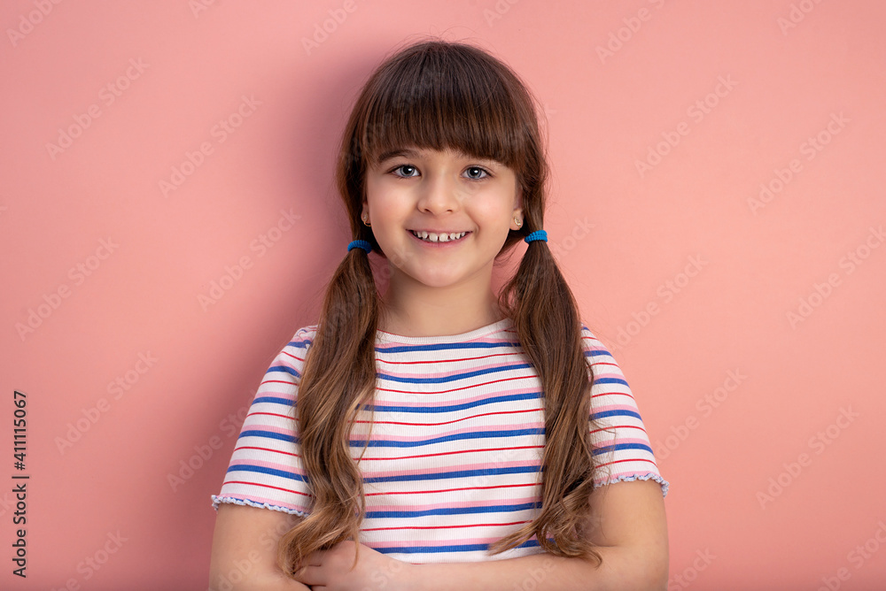 Headshot portrait of happy little girl posing in studio Headshot portrait of happy little girl posing in studio