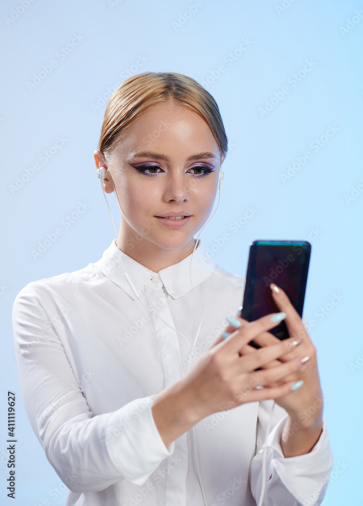 Teenager hold smartphone in front Teenager hold smartphone in front
