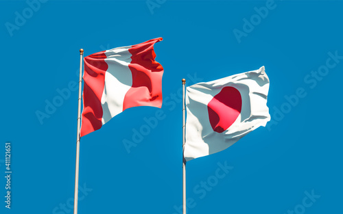 Flags of Peru and Japan.