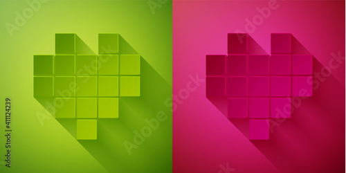 Paper cut Pixel hearts for game icon isolated on green and pink background. Paper art style. Vector.
