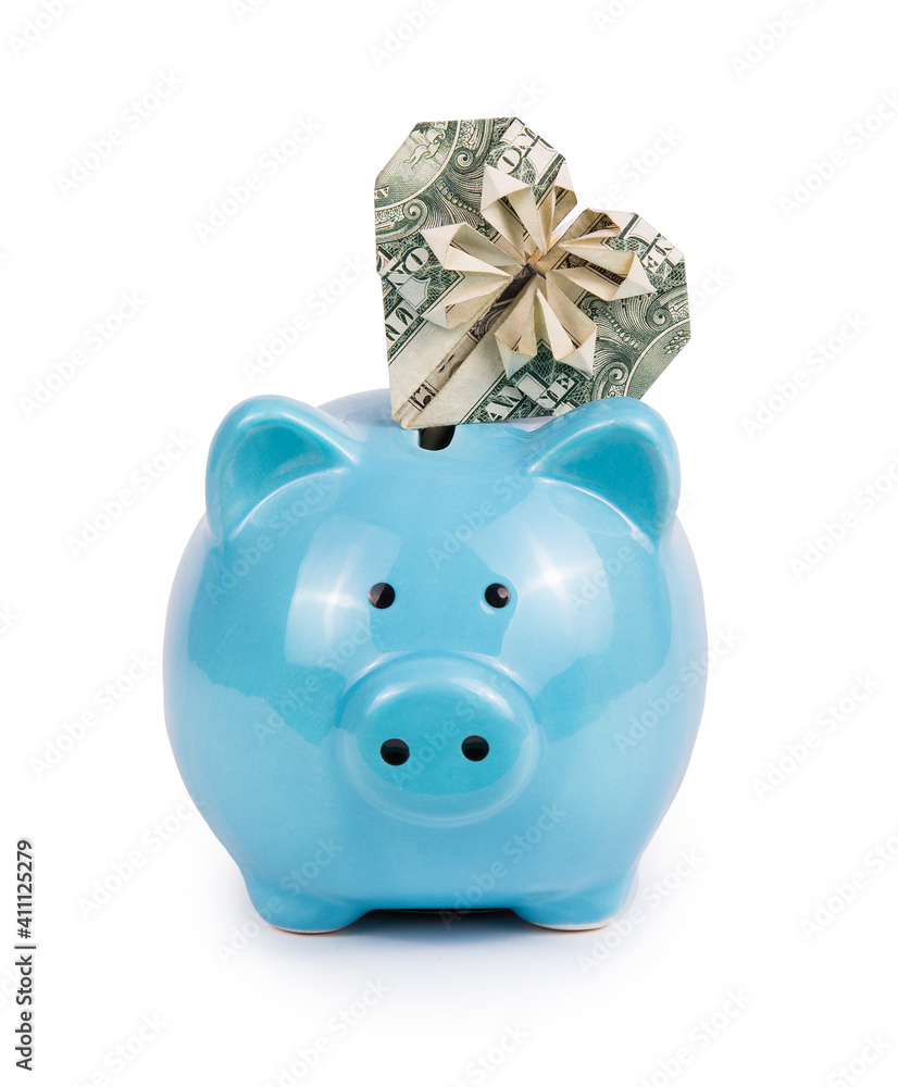 Blue piggy bank and dollar heart. Origami heart from banknote