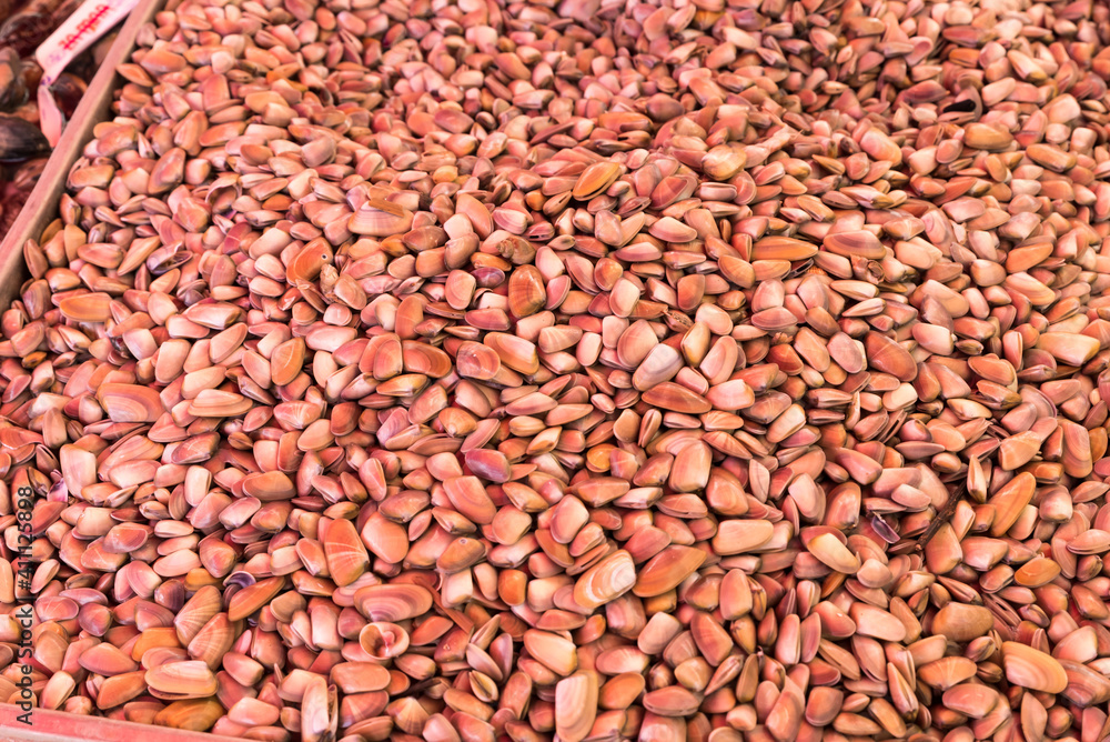 Pink molluscs at the market