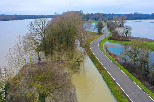 Aerial view flooded forest plains with country road , Rhine River, Rhineland Palatinate, Germany photo