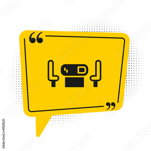 Black Poker table icon isolated on white background. Yellow speech bubble symbol. Vector.