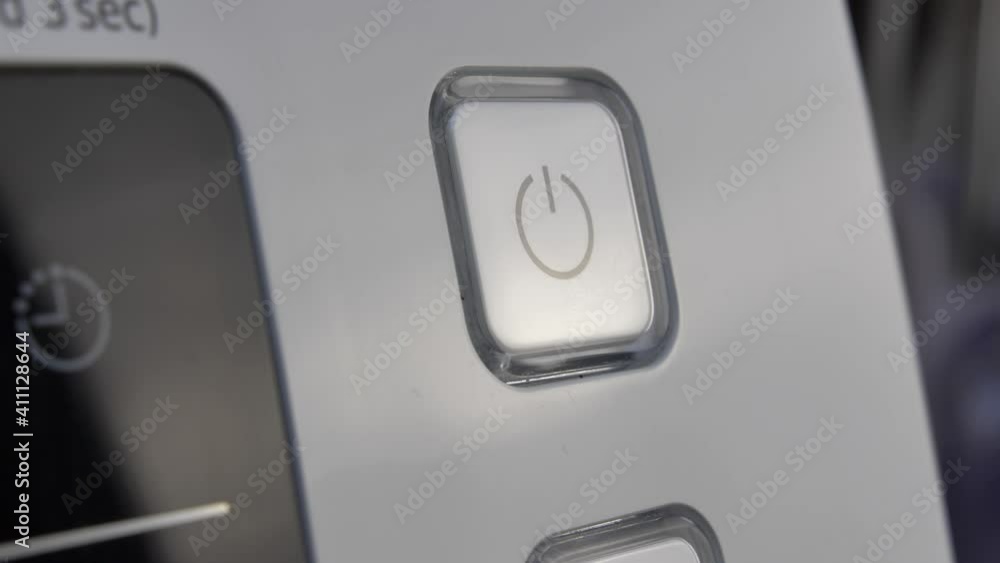 Pressing Stand By Power Button To Turn On and Off the Device Close-Up Pressing Stand By Power Button To Turn On and Off the Device Close-Up
