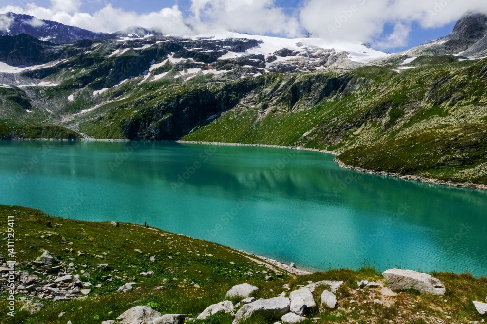 wonderful green water from a water reservoir in the glacier world