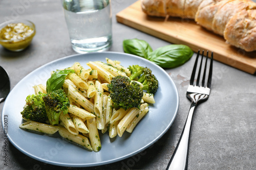 Delicious pasta with broccoli  on dark background