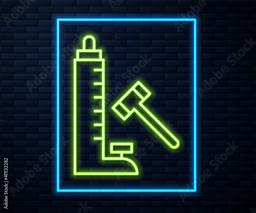 Glowing neon line High striker attraction with big hammer icon isolated on brick wall background. Attraction for measuring strength. Amusement park. Vector.
